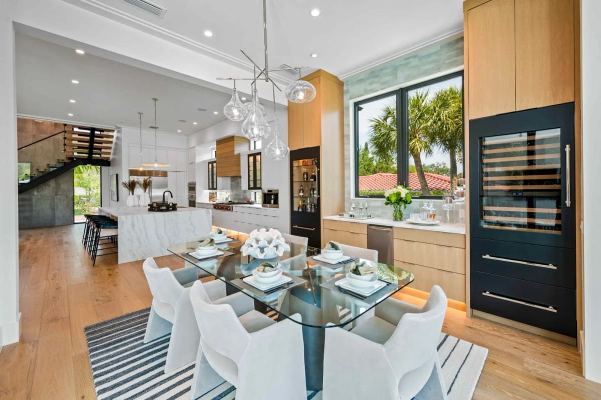 Dining area beside the kitchen and wine wall