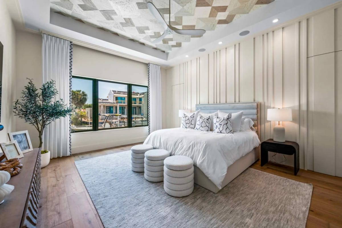 Primary bedroom with waterfront views