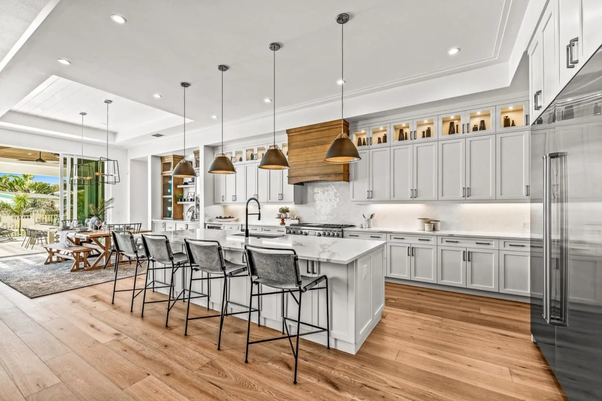 Kitchen with large island and pendant lights