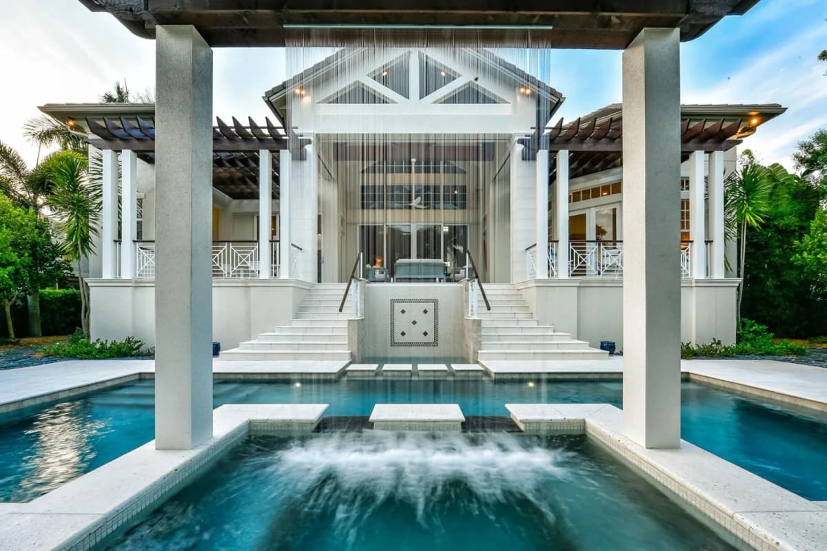 Pool with trellised rain feature