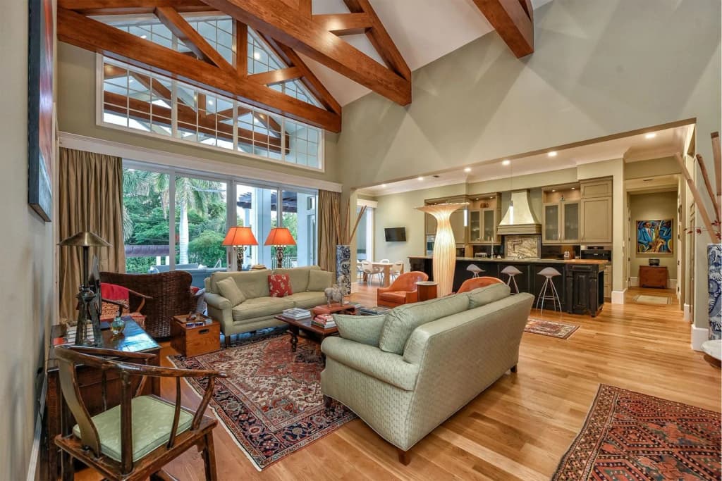 Great room with exposed beams at The Seaside