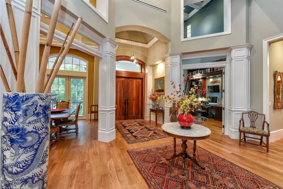 Foyer and dining with arched doorways