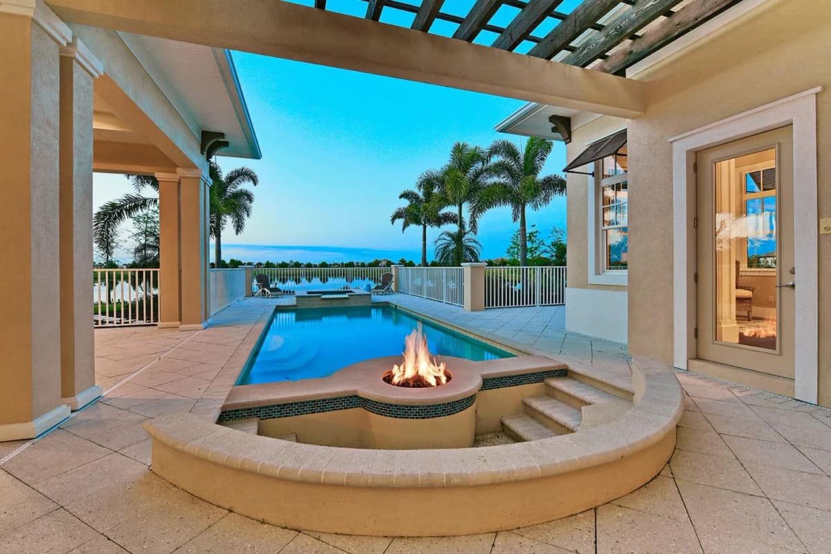 Sunken fire pit beside the pool